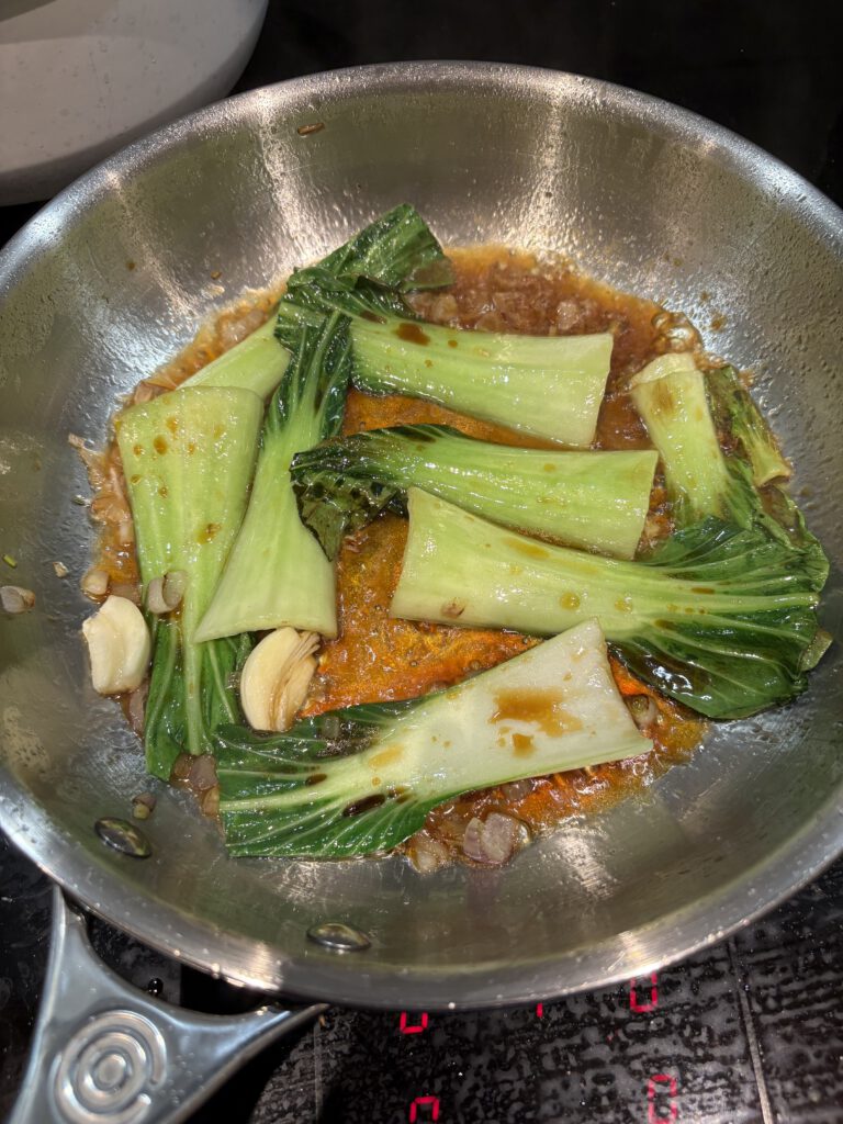 Gratinierte Jacobsmuschel auf Couscous & Pak Choi